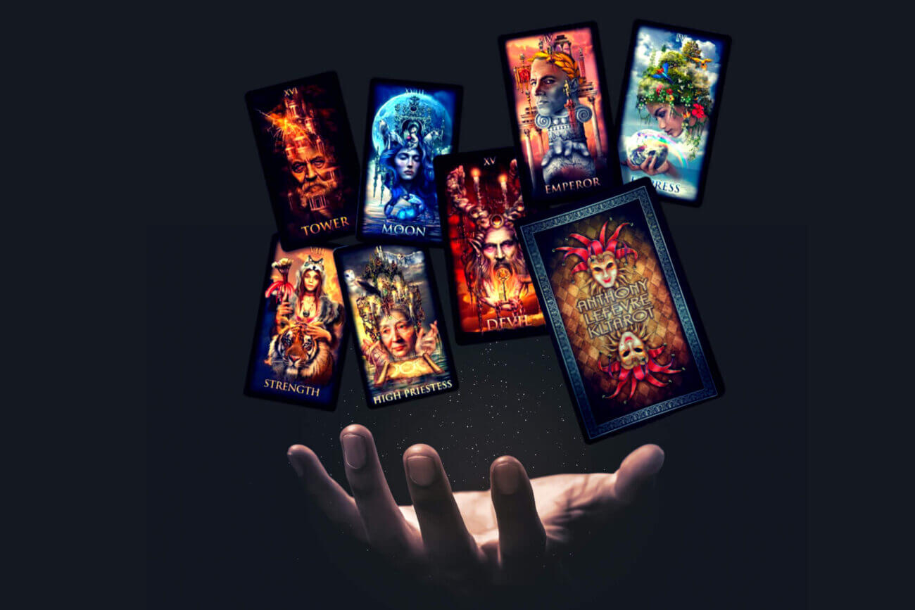 KL Tarot, Anthony Lefevre's hand is holding a bunch of tarot cards.